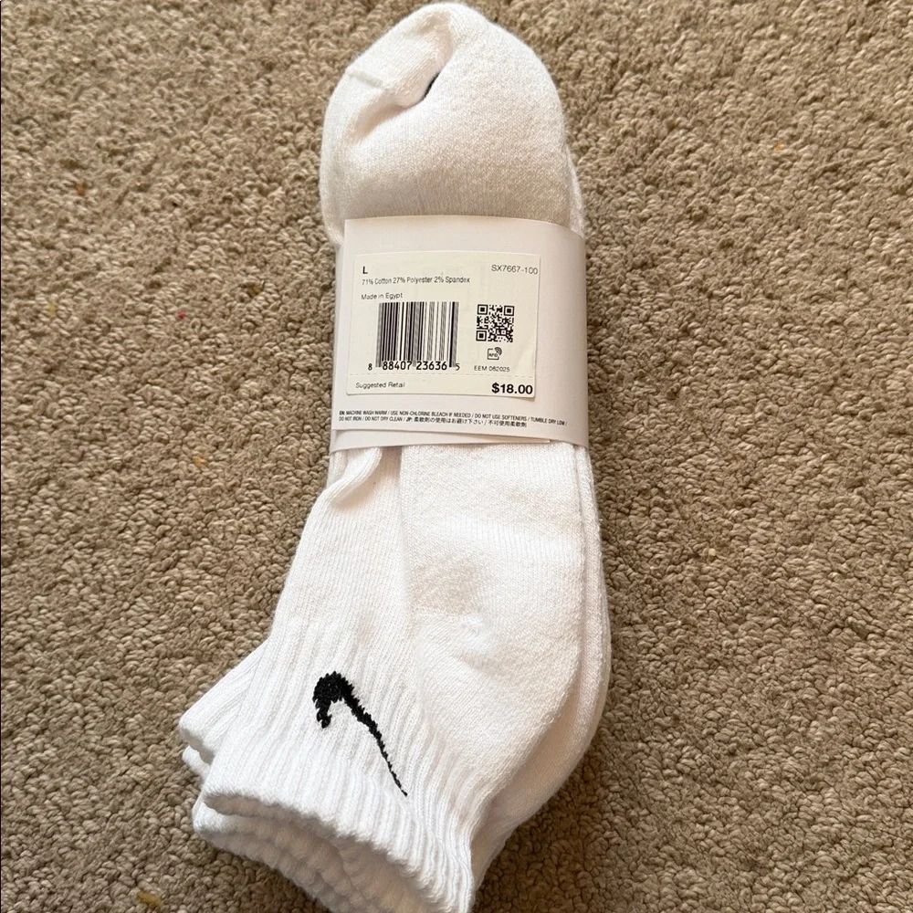 Nike DRI FIT Everyday White Crew Socks with Black Logo.